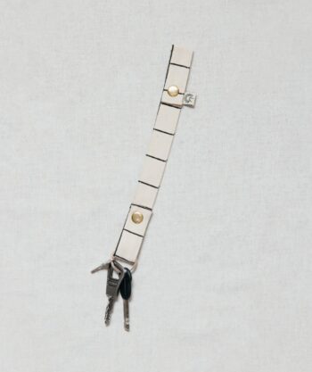 Bande porte-clé avec pressions